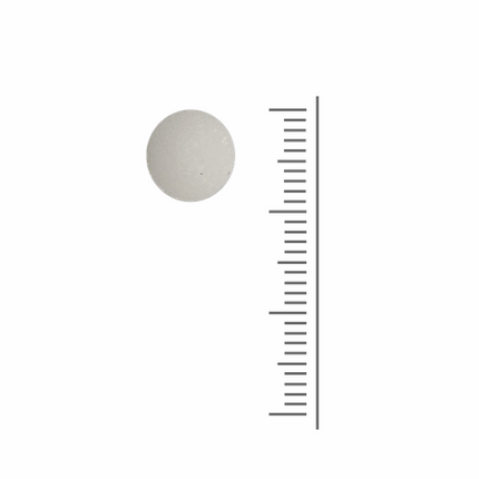 Ronde witte tablet van Zink Methionine naast een meetlat